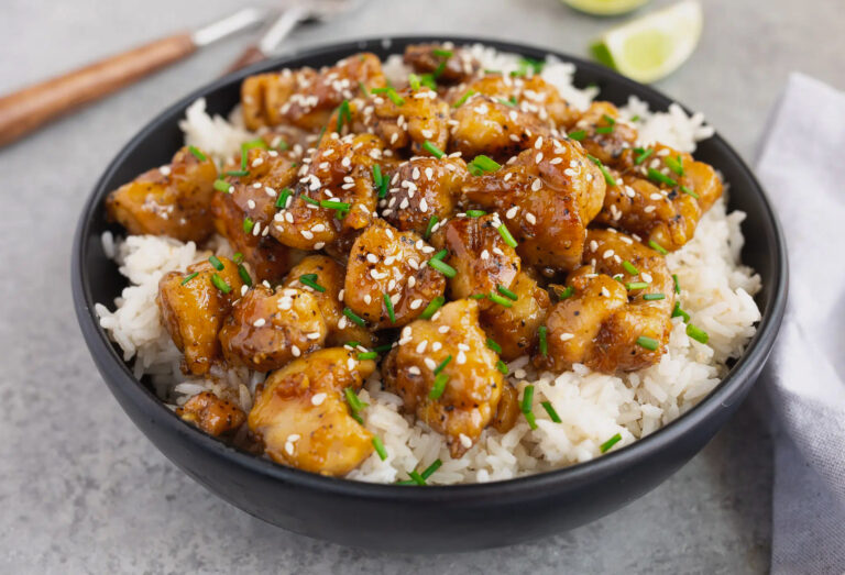 Honey Garlic Chicken Rice Bowl meal prep served with white rice and green onions